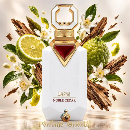 Frasco de Noble Cedar de French Avenue 100 ml rodeado de bergamotas, flores de azahar y fragmentos de madera de cedro.