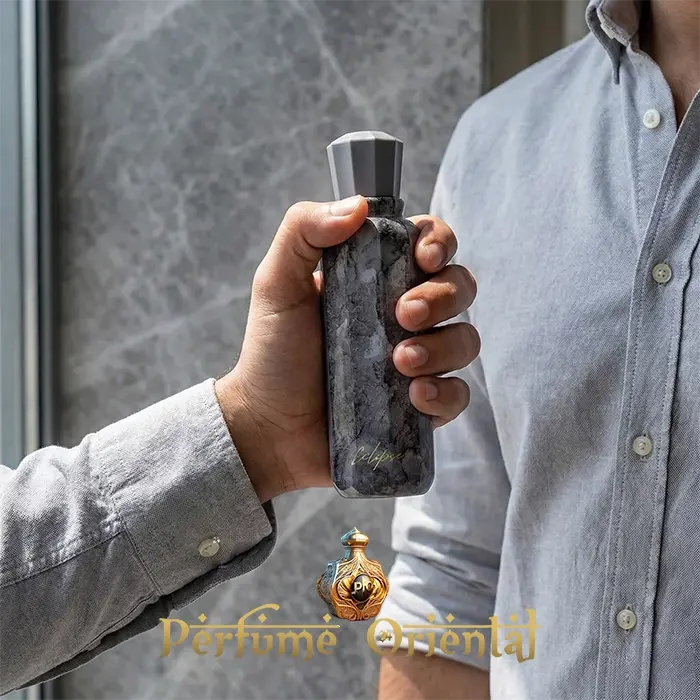 Eclipse Naseem Sky Collection perfume árabe masculino 100ml frasco negro marmoleado en mano