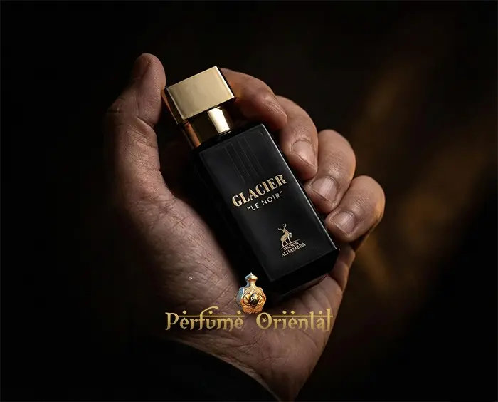 Perfume árabe Glacier Le Noir 30ml Maison Alhambra frasco negro en mano con diseño elegante y masculino