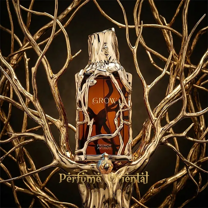 GROW French Avenue Extrait de Parfum luxury perfume bottle surrounded by golden branches artistic studio shot