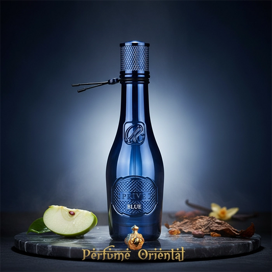 Botella azul de perfume masculino RIIFFS PRIVÉ ESSENCE BLUE 100 ml sobre fondo oscuro, con manzana verde y vainilla | Perfume Oriental